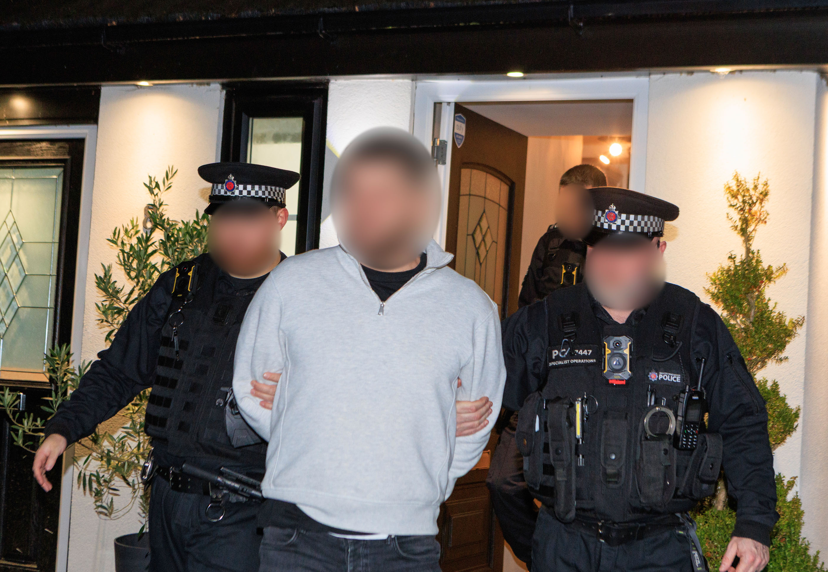 Two arrested in early morning warrants in Royton and Middleton