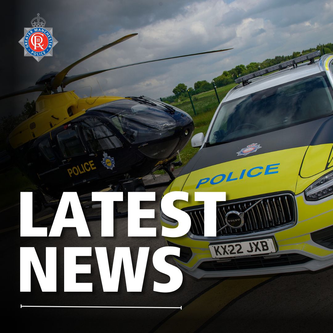 Image of GMP police car and helicopter.