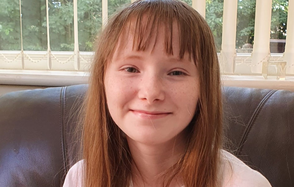 A man has been charged after a young girl died in a collision in Bury