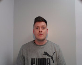 A getaway driver who helped three masked men rob a Tesco Express in Cheadle Heath has been jailed