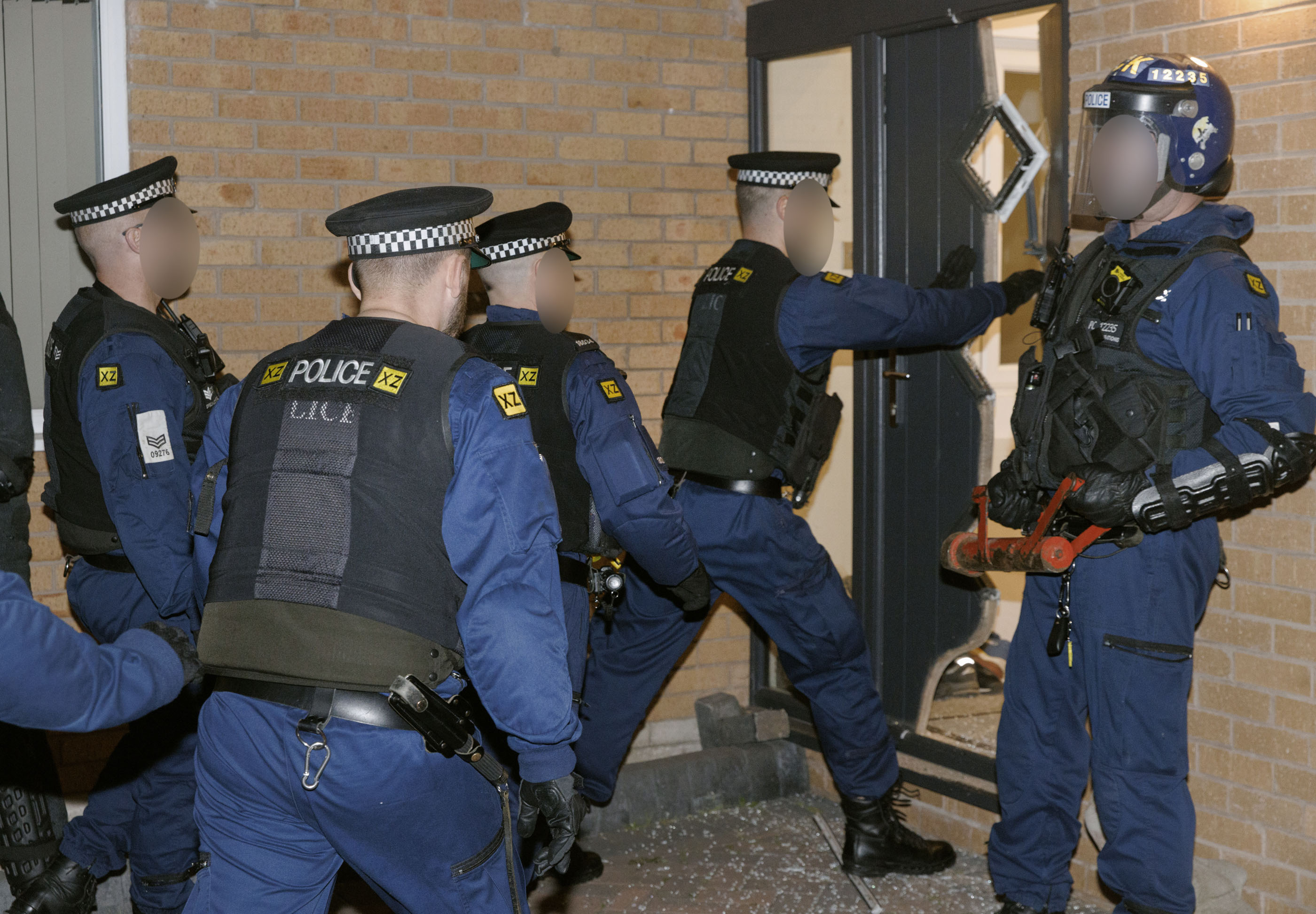 Four simultaneous warrants took place in Partington, Manchester and Lymm in Cheshire.