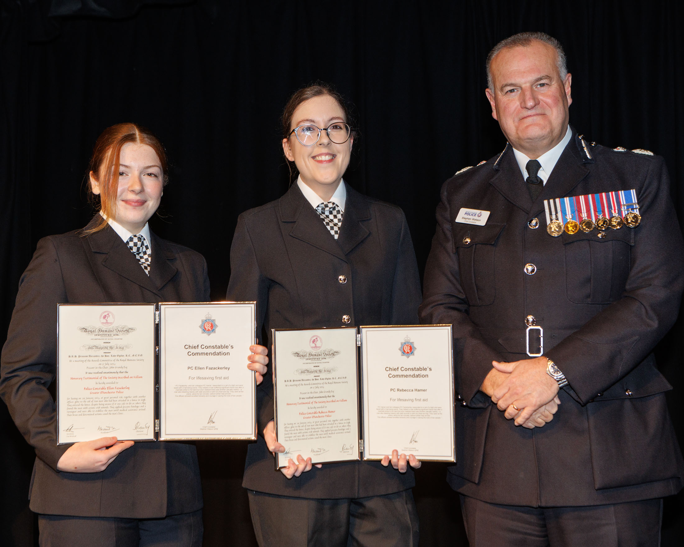 CC Stephen Watson awards PCs Hamer and Fazackerley