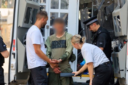 Officers conducting search of a male suspect