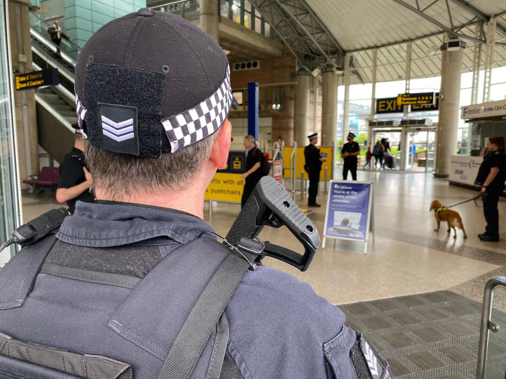 Police officer at Manchester Airport