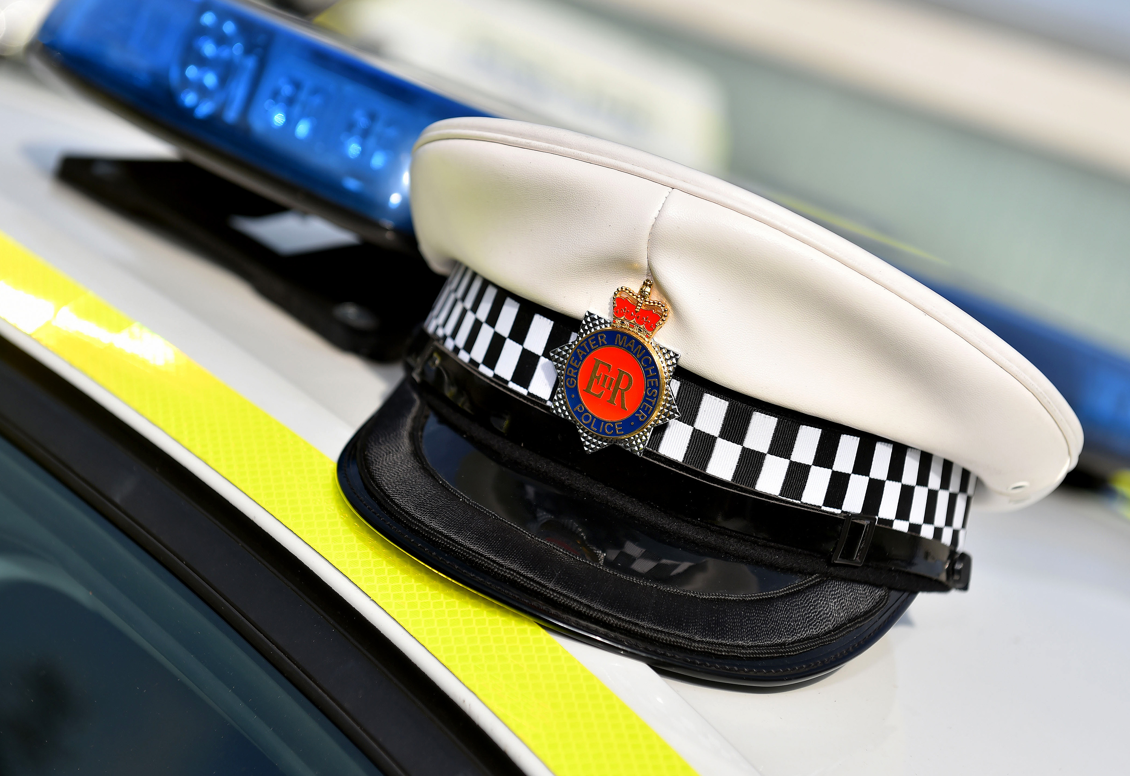Police Officer's hat on top of Road Policing Unit vehicle 