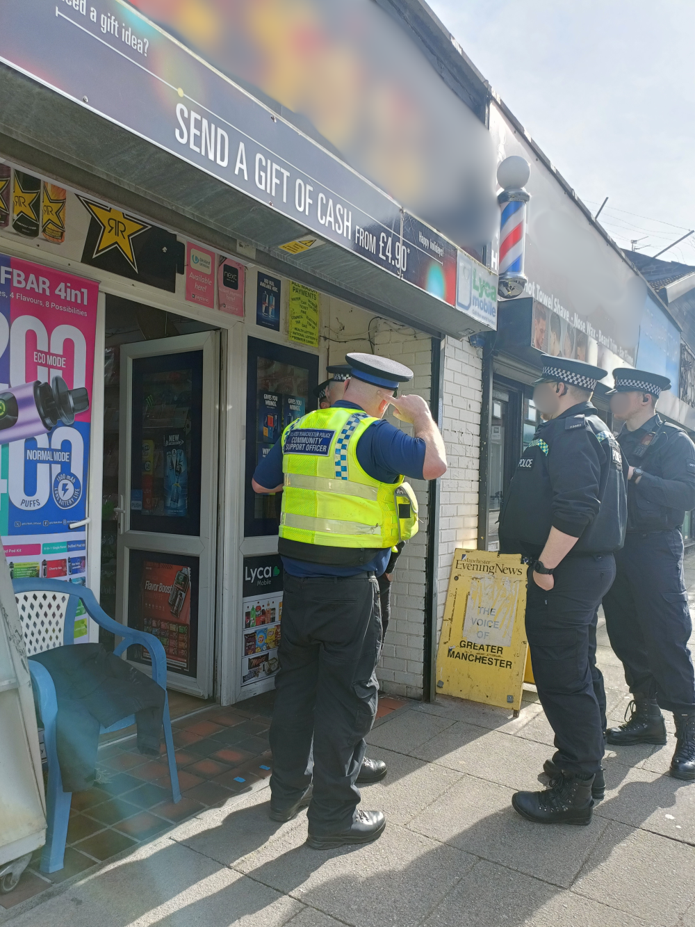 Officers conduct warrant at business premises in Hyde town centre.