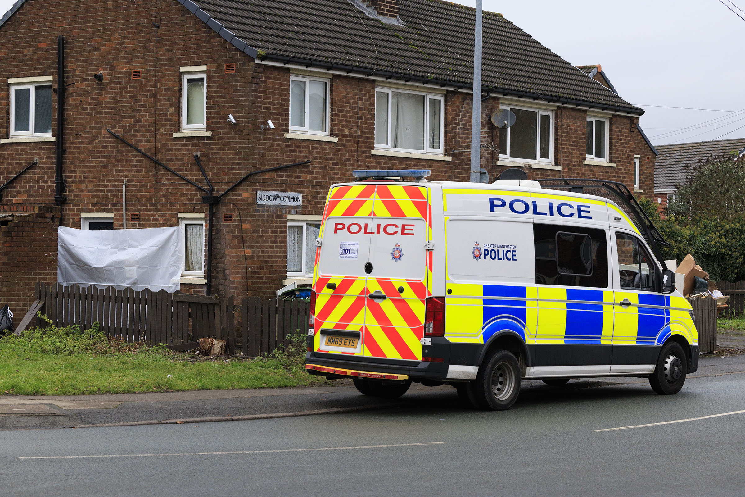 Greater Manchester Police van outside of address on Siddow Common in Leigh.