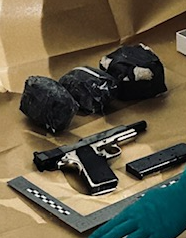 Firearm recovered at a business address in Irlam, Salford.