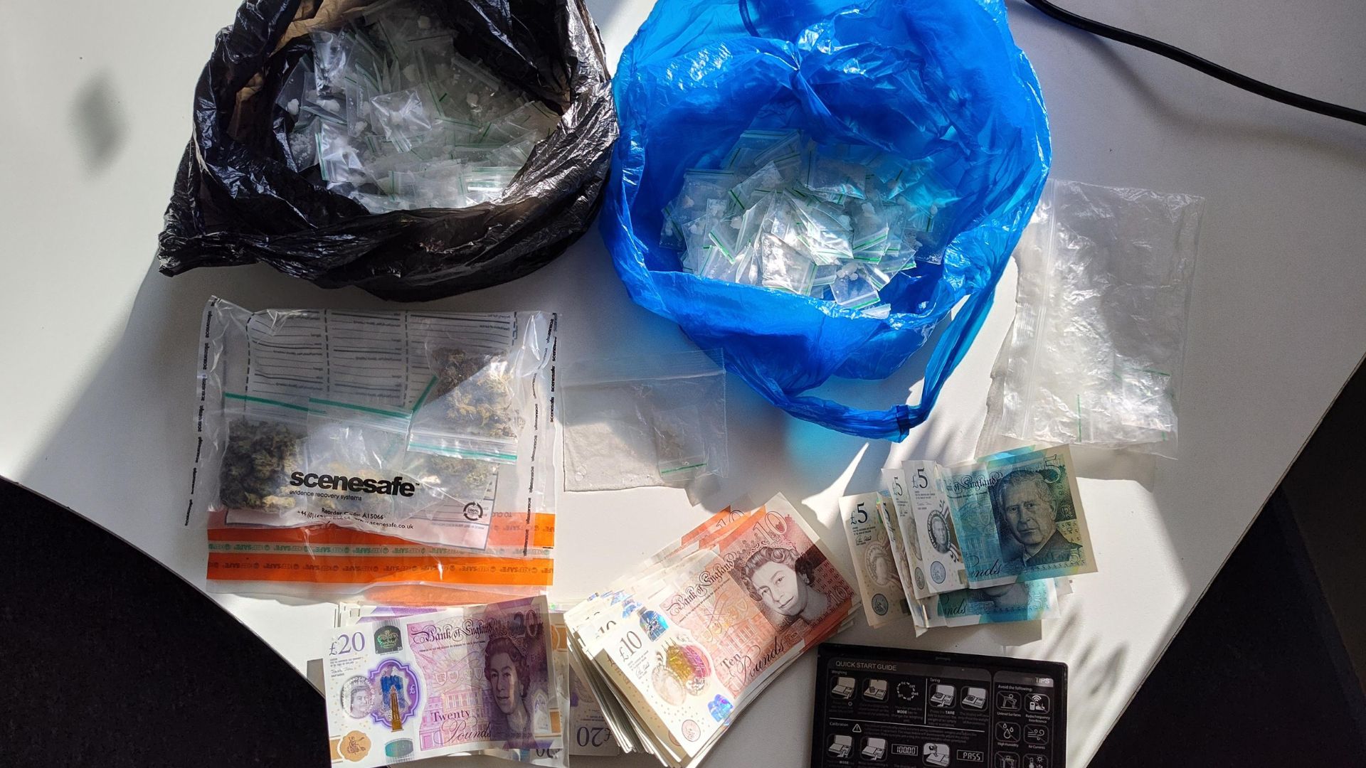 Class A & B drugs, along with cash recovered from a property on Royalthorn Avenue in Benchill, Wythenshawe.